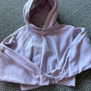 Aritzia TNA Cozy Fleece cropped hoodie